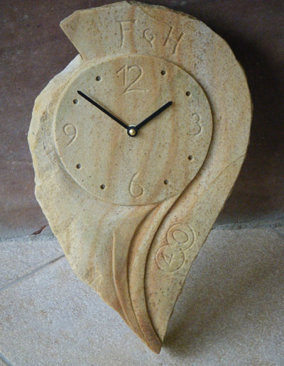 Lansmann: Wanduhr Sandstein